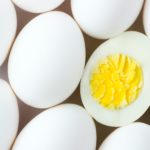 white egg lot on brown wooden table